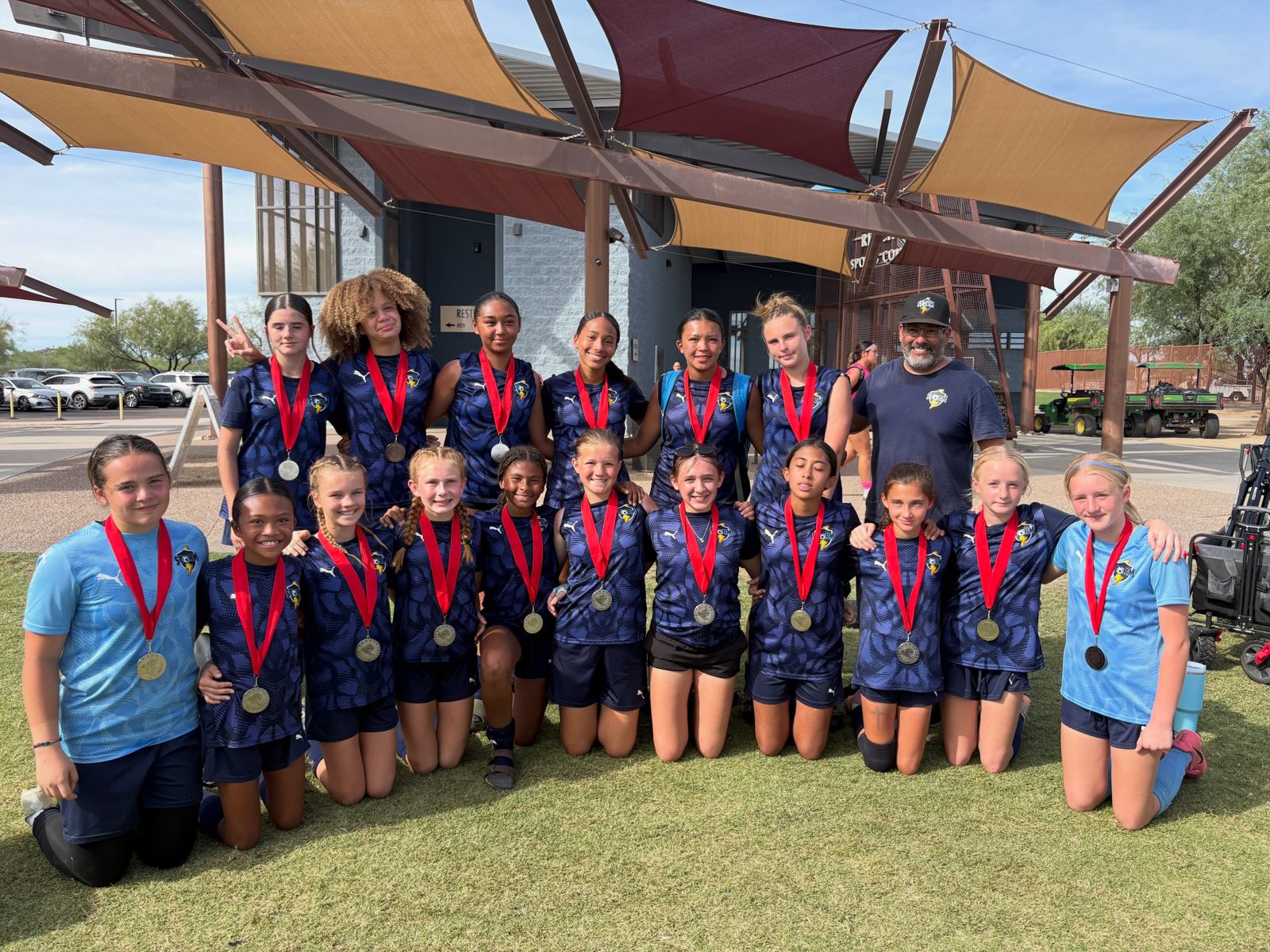 GU14 Academy girls team with medals